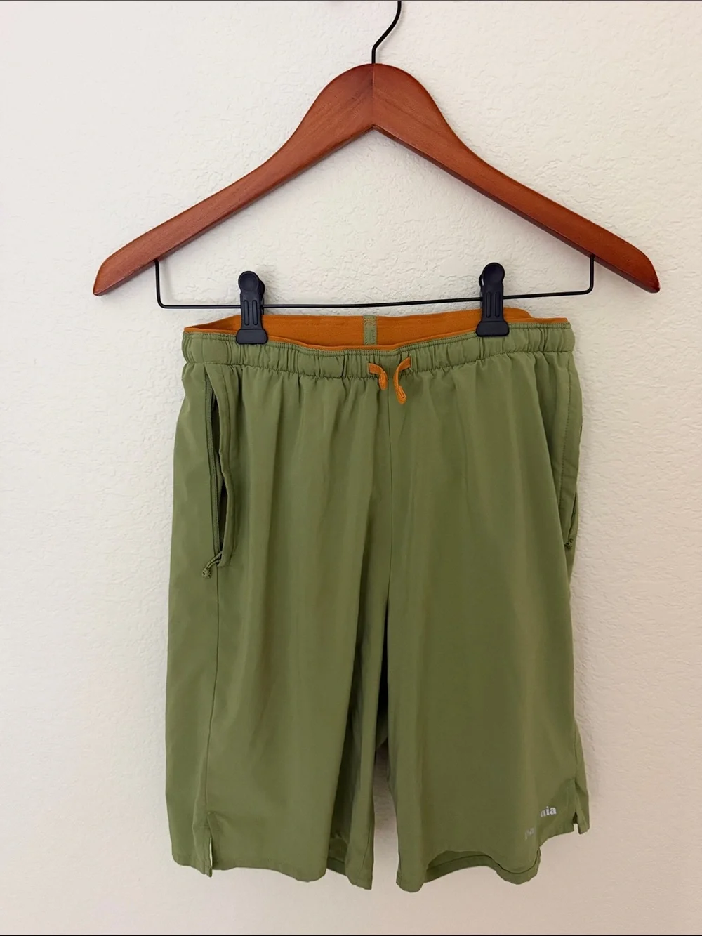 Patagonia Olive Green Athletic Shorts with Orange Accent